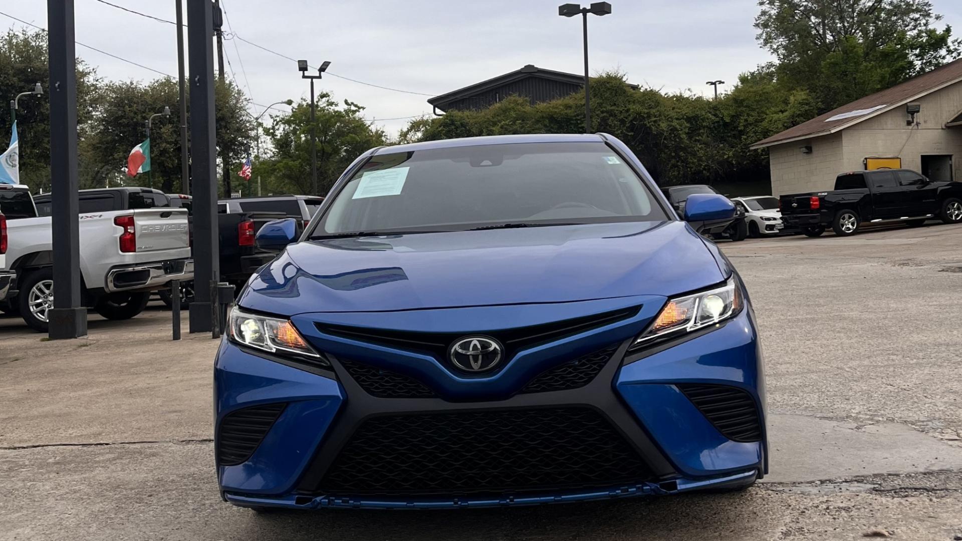 2020 Blue Toyota Camry (4T1G11AK9LU) , located at 945 E. Jefferson Blvd, Dallas, TX, 75203, (214) 943-7777, 32.752514, -96.811630 - Photo#2